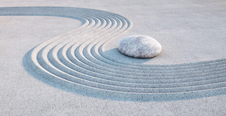 Fototapeta na wymiar Japanese ZEN garden - single stone and raked sand in the evening sun