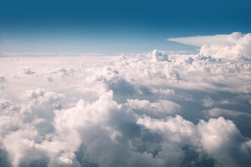 Fototapeta premium Cumulus clouds landscape from aircraft, fly high