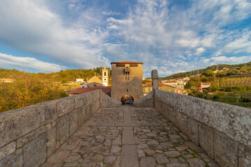 Fortified Tower and Bridge in the town of Ucanha, in Tarouca, Viseu, Portugal - obrazy, fototapety, plakaty