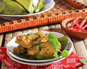 Pepes Ayam (Pais Hayam) is Indonesian Steamed Curry Chicken with Traditional Recipe
