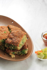 Martabak Telur is Popular Street Food in Indonesia. Egg, Spring Onion Wrapped with Thin Flour Batter