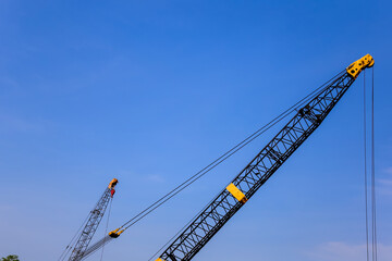 Fototapeta na wymiar construction crane against sky