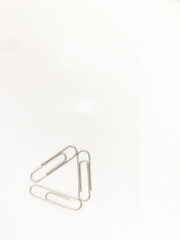 paper clips  on white paper background