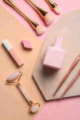 Composition with cosmetics and makeup accessories on color background, closeup