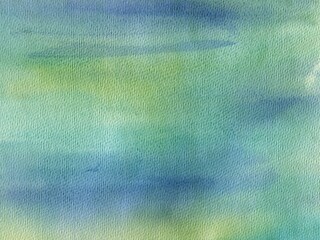 Yellow, Green and Blue Hand Drawn Watercolor Paint Texture Background.