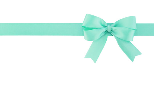 single green mint ribbon with bow isolated on white background, simple double tied bow for decoration gift box or greeting card or banner advertising, flat lay close-up top view with copy space