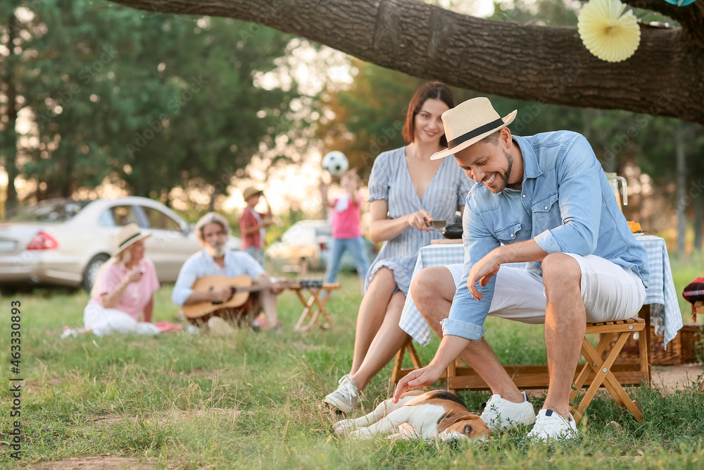 Wall mural happy couple at barbecue party on summer day