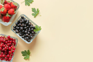 Bowls with different ripe berries on color background