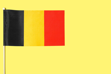 Flag of Belgium on color background