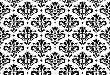 Wallpaper in the style of Baroque. Seamless vector background. White and black floral ornament. Graphic pattern for fabric, wallpaper, packaging. Ornate Damask flower ornament