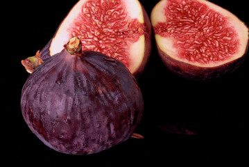 figs lie on a black background