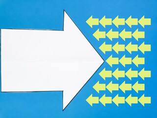 White big arrow facing individual pointing in the different way against blue background.