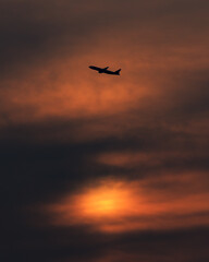 Fototapeta na wymiar Beautiful Sunset Sky and Airplane