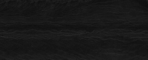Fototapeta premium Panorama dark gray stone background with copy space. Black grunge banner with rock texture.