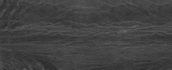 Abstract dark grey black slate background or texture.