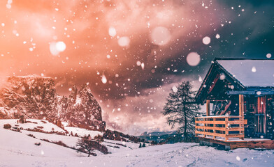 Naklejka premium Snowfall at Alpe de Siusi in the sunset.