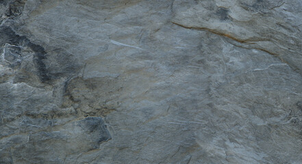 The texture of the stone wall. Close-up. Light gray rock backdrop.