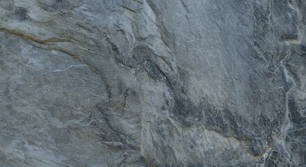 The texture of the stone wall. Close-up. Light gray rock backdrop.