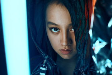 Asian teenage girl portrait in neon light