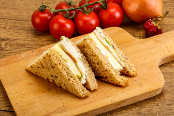 Club sandwich with chicken and cheese