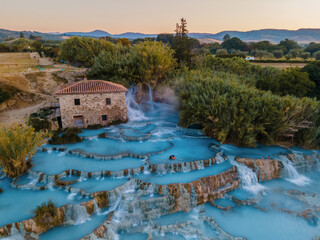natural spa with waterfalls and hot springs at Saturnia thermal baths, Grosseto, Tuscany, Italy,Hot...