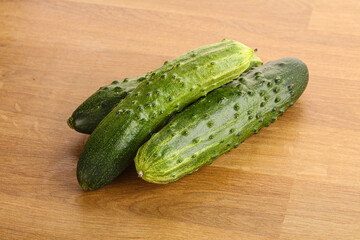 Fersh juicy green cucumbers heap