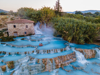 natural spa with waterfalls and hot springs at Saturnia thermal baths, Grosseto, Tuscany, Italy,Hot...