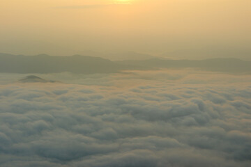 Fototapeta na wymiar foggy landscape of mist at sunrise