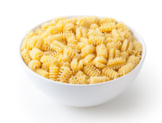 Uncooked radiatori pasta in white ceramic bowl isolated on white background with clipping path