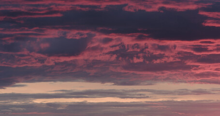 Purple clouds last minutes before sunset