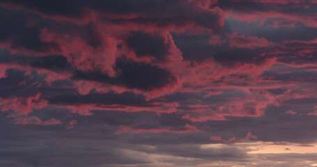 Purple clouds last minutes before sunset