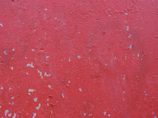 Abstract background of time-damaged paint on wall.