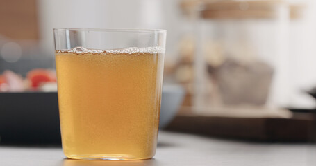 ginger beer in tumbler glass with copy space
