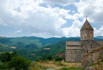 Fototapeta na wymiar the Tatev monastery is above the river Vorotans canyon, in thick walls is monks cells
