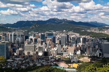 The buildings in Jongno and the scenery of Bukaksan Mountain in Seoul, South Korea.