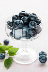 Blueberries on tile background