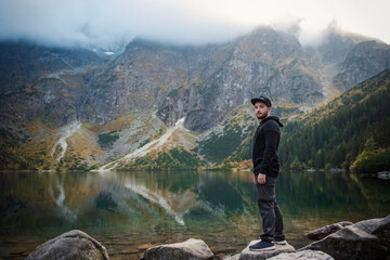 Tourist  near the mountain lake Morskie Oko in Tatra National Park, Poland. © Olena Rudo