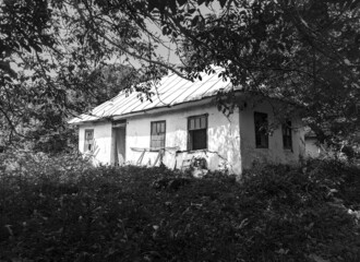 abandoned old rural house in black and white