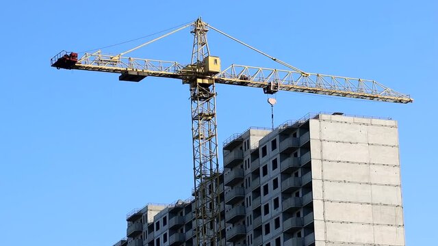 Construction crane on the construction site