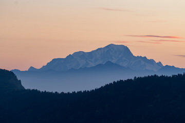 Layers of mountains in the fog with Mont Blanc in the background