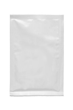 White paper sachet packet isolated on white.