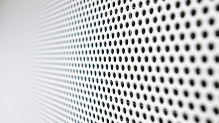 Background image of a white perforated sheet metal