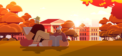 senior couple reading books in urban park old man and woman family spending time together relaxation retirement