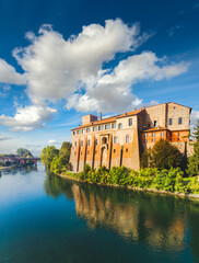 Fototapeta premium Aerial view of Adda river, with the castle of Cassano d'Adda town, Lombardy, Italy