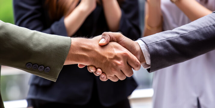 The banner of  successful Businesspeople team work which handshake and Success concept of handshaking after good deal while the greeting of friendship in the office background