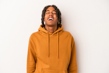Fototapeta premium Young african american man isolated on white background relaxed and happy laughing, neck stretched showing teeth.