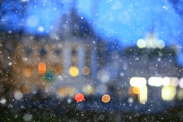 Fototapeta na wymiar abstract snow blurred background city lights, winter holiday new year