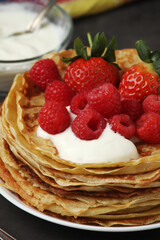Russian cuisine national dish bliny with fresh berries