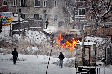 Firefighters with the inscription on the back in Russian 