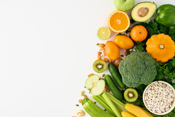 Set of proper balanced nutrition, healthy vegetarian food. Avocado, orange and parsley. Cucumber,...